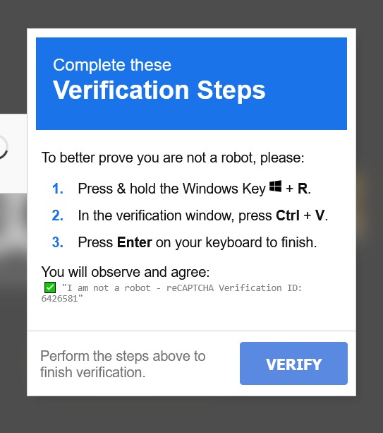 Screenshot of the suspicious visitor facing page and clipboard social engineering prompt
